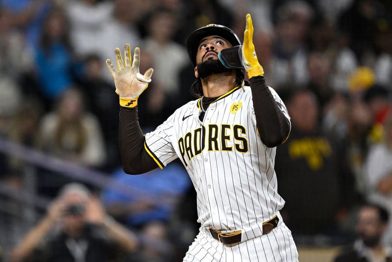 Jun 10, 2024; San Diego, California, USA; San Diego Padres right fielder Fernando Tatis Jr. (23) celebrates after hitting a home run against the Oakland Athletics during the fifth inning at Petco Park. Mandatory Credit: Orlando Ramirez-USA TODAY Sports