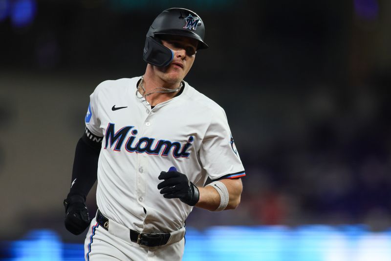 Sep 19, 2024; Miami, Florida, USA; Miami Marlins right fielder Griffin Conine (56) circles the bases after hitting a two-run home run against the Los Angeles Dodgers during the fifth inning at loanDepot Park. Mandatory Credit: Sam Navarro-Imagn Images