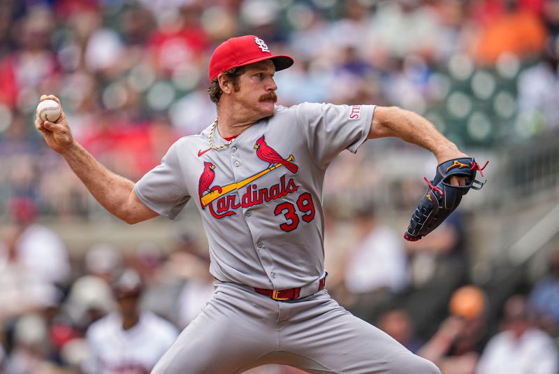 Apr 23, 2025; Cumberland, Georgia, USA; St. Louis Cardinals pitcher Miles Mikolas (39) pitches against the Atlanta Braves during the first inning at Truist Park. Mandatory Credit: Dale Zanine-Imagn Images