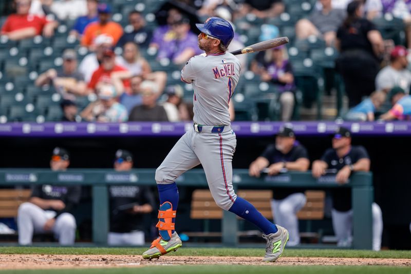Jun 8, 2025; Denver, Colorado, USA; New York Mets second baseman Jeff McNeil (1) hits a double in the seventh inning against the Colorado Rockies at Coors Field. Mandatory Credit: Isaiah J. Downing-Imagn Images
