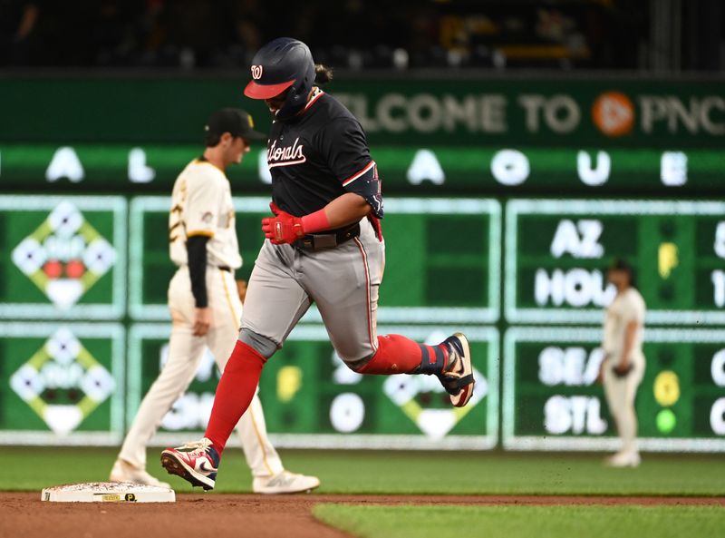 Sep 7, 2024; Pittsburgh, Pennsylvania, USA; Washington Nationals first baseman Andres Chaparro (19) rounds the bases after hitting a game-tying two-run home run against the Pittsburgh Pirates during the seventh inning of the second game of a double header at PNC Park. Mandatory Credit: Philip G. Pavely-Imagn Images