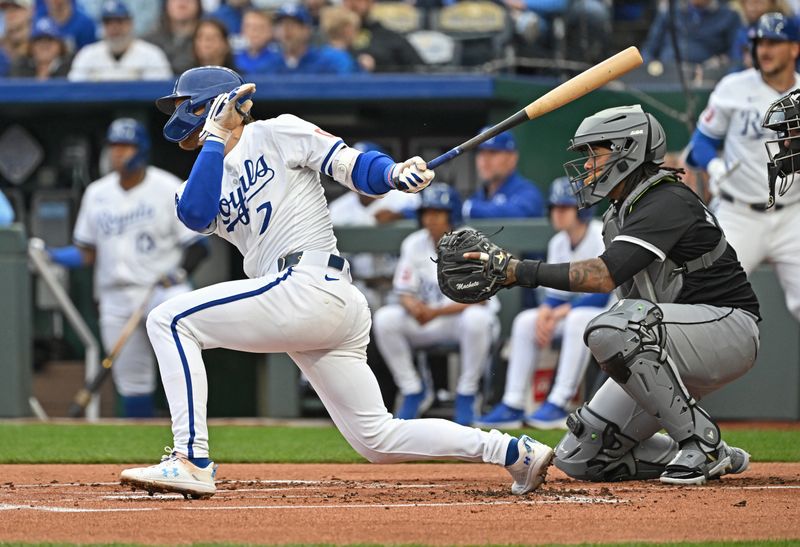 Apr 6, 2024; Kansas City, Missouri, USA; Kansas City Royals shortstop Bobby Witt Jr. (7) singles in the first inning against the Chicago White Sox at Kauffman Stadium. Mandatory Credit: Peter Aiken-USA TODAY Sports