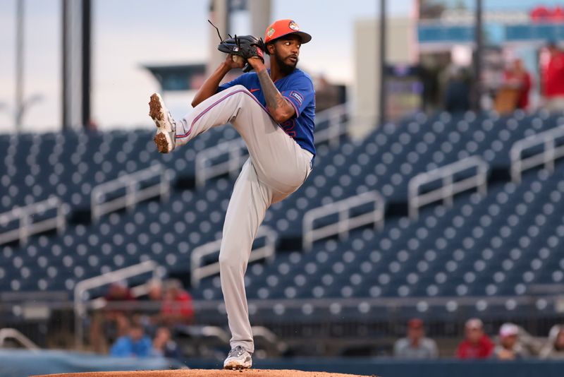 Mar 13, 2026; West Palm Beach, Florida, USA; New York Mets starting pitcher Carl Edwards Jr. (52) delivers a pitch against the Washington Nationals during the first inning at CACTI Park of the Palm Beaches. Mandatory Credit: Sam Navarro-Imagn Images