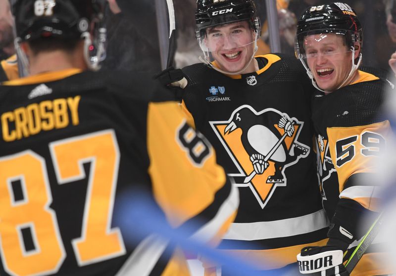 Nov 25, 2023; Pittsburgh, Pennsylvania, USA; Pittsburgh Penguins left wing Jake Guentzel (59) celebrates a goal with left wing Drew O   Connor (10) and center Sidney Crosby (87) against the Toronto Maple Leafs during the first period at PPG Paints Arena. Mandatory Credit: Philip G. Pavely-USA TODAY Sports