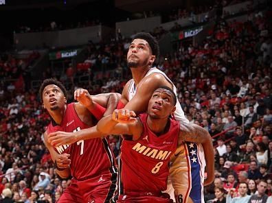 MIAMI, FL - DECEMBER 25:  Kyle Lowry #7 and Jamal Cain #8 of the Miami Heat plays defense against the Philadelphia 76ers on December 25, 2023 at Kaseya Center in Miami, Florida. NOTE TO USER: User expressly acknowledges and agrees that, by downloading and or using this Photograph, user is consenting to the terms and conditions of the Getty Images License Agreement. Mandatory Copyright Notice: Copyright 2023 NBAE (Photo by David Sherman/NBAE via Getty Images)