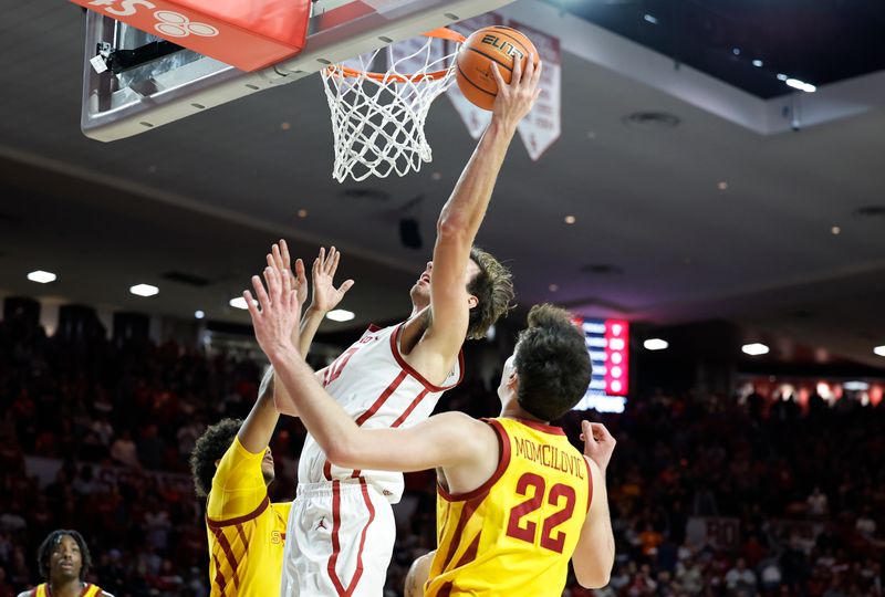 Jan 6, 2024; Norman, Oklahoma, USA; Oklahoma Sooners forward Sam Godwin (10) shoots against the Iowa State Cyclones during the second half at Lloyd Noble Center. Mandatory Credit: Alonzo Adams-USA TODAY Sports