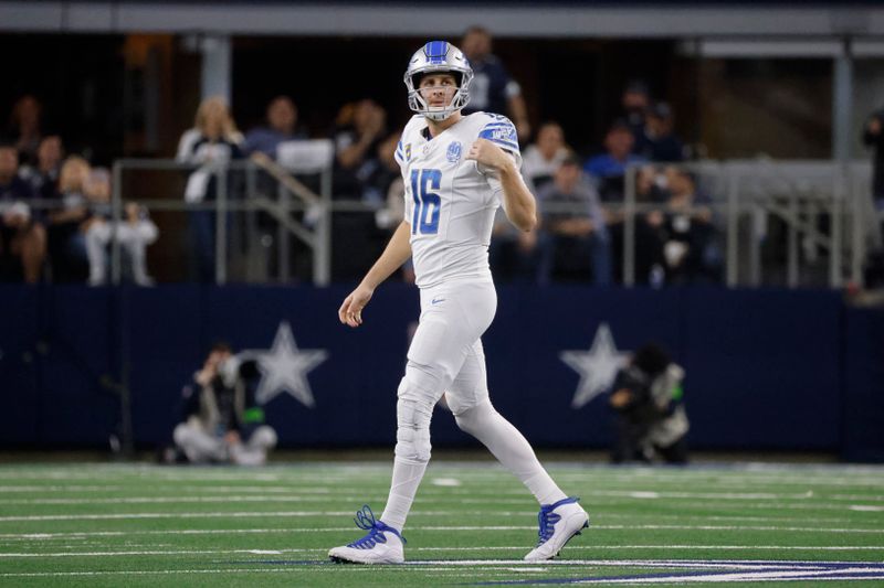 Detroit Lions quarterback Jared Goff walks off the field after throwing an interception against the Dallas Cowboys during the first half of an NFL football game, Saturday, Dec. 30, 2023, in Arlington, Texas. (AP Photo/Michael Ainsworth)