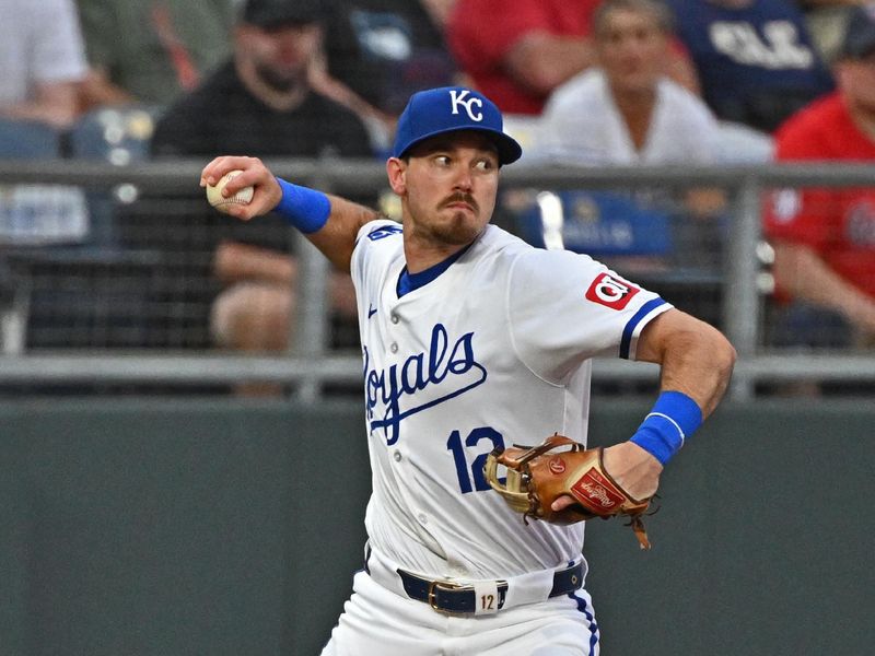 Jun 27, 2024; Kansas City, Missouri, USA; Kansas City Royals third baseman Nick Loftin (12) throws the ball to second base for an out in the fourth inning against the Cleveland Guardians at Kauffman Stadium. Mandatory Credit: Peter Aiken-USA TODAY Sports