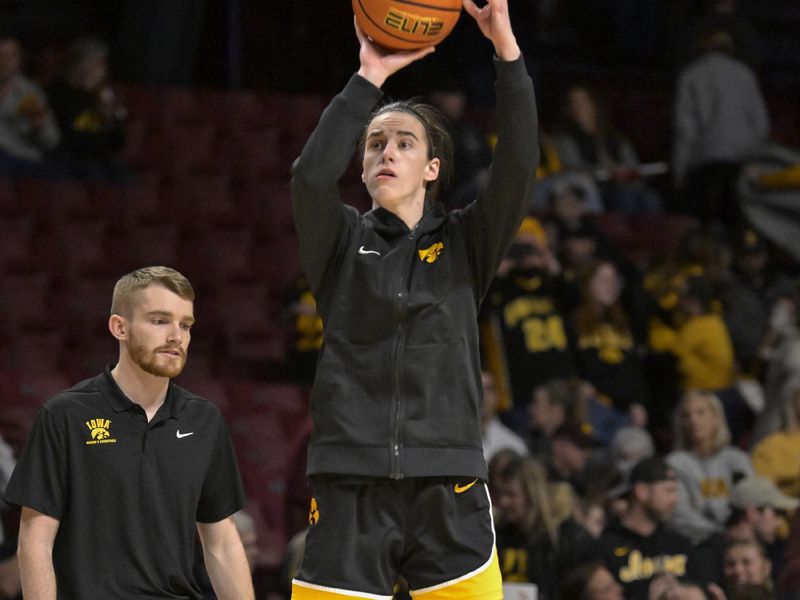 Feb 28, 2024; Minneapolis, Minnesota, USA; Iowa Hawkeyes guard Caitlin Clark (22) warms up before a game against the Minnesota Golden Gophers at Williams Arena. Mandatory Credit: Nick Wosika-USA TODAY Sports