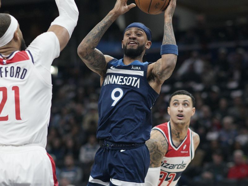 WASHINGTON, DC - JANUARY 24: Nickeil Alexander-Walker #9 of the Minnesota Timberwolves jumps for a rebound against the Washington Wizards during the first halfat Capital One Arena on January 24, 2024 in Washington, DC. NOTE TO USER: User expressly acknowledges and agrees that, by downloading and or using this photograph, User is consenting to the terms and conditions of the Getty Images License Agreement. (Photo by Jess Rapfogel/Getty Images)