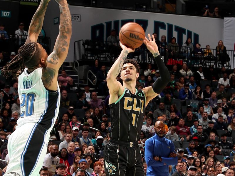 CHARLOTTE, NC - FEBRUARY 5: LaMelo Ball #1 of the Charlotte Hornets shoots a three point basket against the Orlando Magic on February 5, 2023 at Spectrum Center in Charlotte, North Carolina. NOTE TO USER: User expressly acknowledges and agrees that, by downloading and or using this photograph, User is consenting to the terms and conditions of the Getty Images License Agreement. Mandatory Copyright Notice: Copyright 2023 NBAE (Photo by Kent Smith/NBAE via Getty Images)