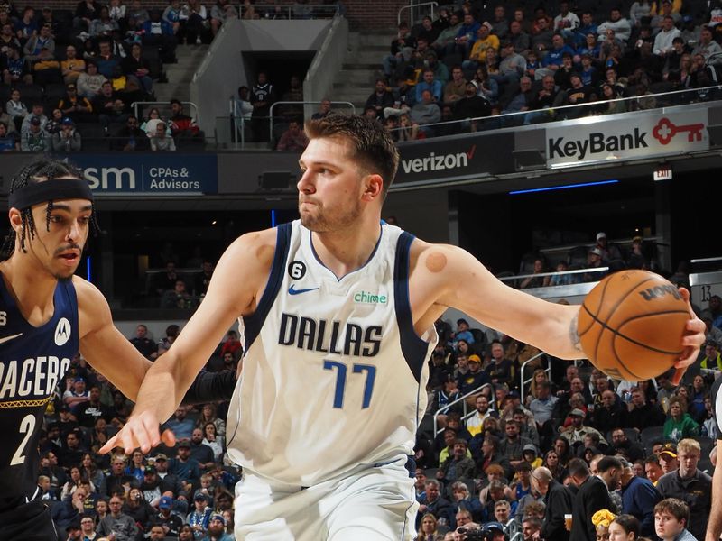 INDIANAPOLIS, IN - MARCH 27: Luka Doncic #77 of the Dallas Mavericks dribbles the ball during the game against the Indiana Pacers on March 27, 2023 at Gainbridge Fieldhouse in Indianapolis, Indiana. NOTE TO USER: User expressly acknowledges and agrees that, by downloading and or using this Photograph, user is consenting to the terms and conditions of the Getty Images License Agreement. Mandatory Copyright Notice: Copyright 2023 NBAE (Photo by Ron Hoskins/NBAE via Getty Images)