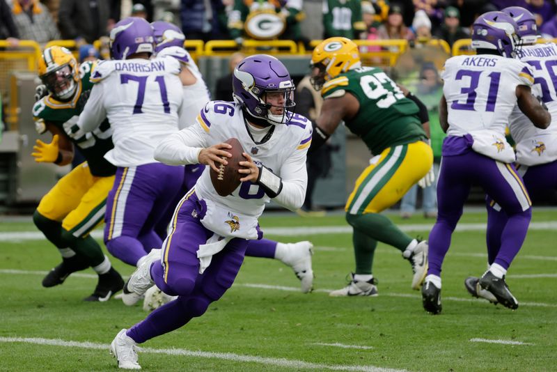 Minnesota Vikings quarterback Jaren Hall (16) looks to pass during the second half of an NFL football game against the Green Bay Packers, Sunday, Oct. 29, 2023, in Green Bay, Wis. (AP Photo/Mike Roemer)