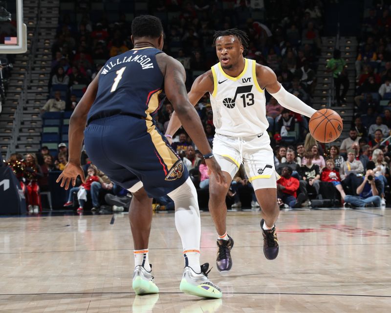 NEW ORLEANS, LA - JANUARY 17:  Isaiah Collier #13 of the Utah Jazz dribbles the ball during the game against the New Orleans Pelicans on January 17, 2025 at the Smoothie King Center in New Orleans, Louisiana. NOTE TO USER: User expressly acknowledges and agrees that, by downloading and or using this Photograph, user is consenting to the terms and conditions of the Getty Images License Agreement. Mandatory Copyright Notice: Copyright 2025 NBAE (Photo by Layne Murdoch Jr./NBAE via Getty Images)