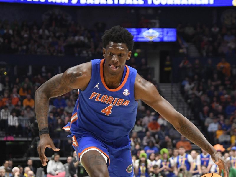 Mar 17, 2024; Nashville, TN, USA;  Florida Gators forward Tyrese Samuel (4) controls the ball in the first half against the Auburn Tigers in the SEC Tournament championship game at Bridgestone Arena. Mandatory Credit: Steve Roberts-USA TODAY Sports