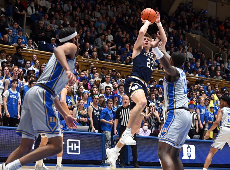 Feb 14, 2023; Durham, North Carolina, USA;  Notre Dame Fighting Irish guard Dane Goodwin (23) shoots over Duke Blue Devils forward Dariq Whitehead(0) during the first half at Cameron Indoor Stadium. Mandatory Credit: Rob Kinnan-USA TODAY Sports