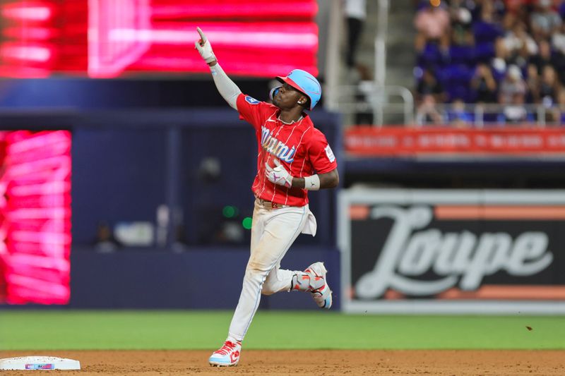 Sep 16, 2023; Miami, Florida, USA; Miami Marlins center fielder Jazz Chisholm Jr. (2) circles the bases after hitting a grand slam against the Atlanta Braves during the eighth inning at loanDepot Park. Mandatory Credit: Sam Navarro-USA TODAY Sports