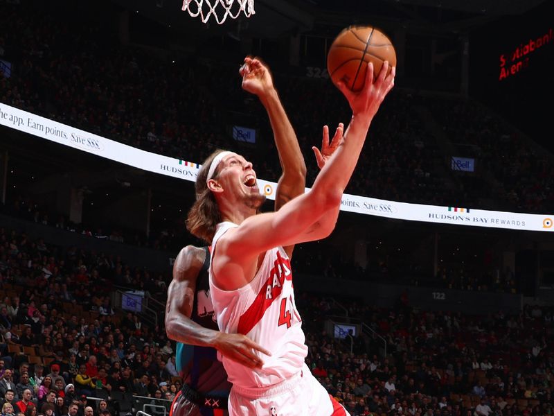 TORONTO, CANADA - MARCH 25: Kelly Olynyk #41 of the Toronto Raptor drives to the basket during the game against the Brooklyn Nets on March 25, 2024 at the Scotiabank Arena in Toronto, Ontario, Canada.  NOTE TO USER: User expressly acknowledges and agrees that, by downloading and or using this Photograph, user is consenting to the terms and conditions of the Getty Images License Agreement.  Mandatory Copyright Notice: Copyright 2024 NBAE (Photo by Vaughn Ridley/NBAE via Getty Images)