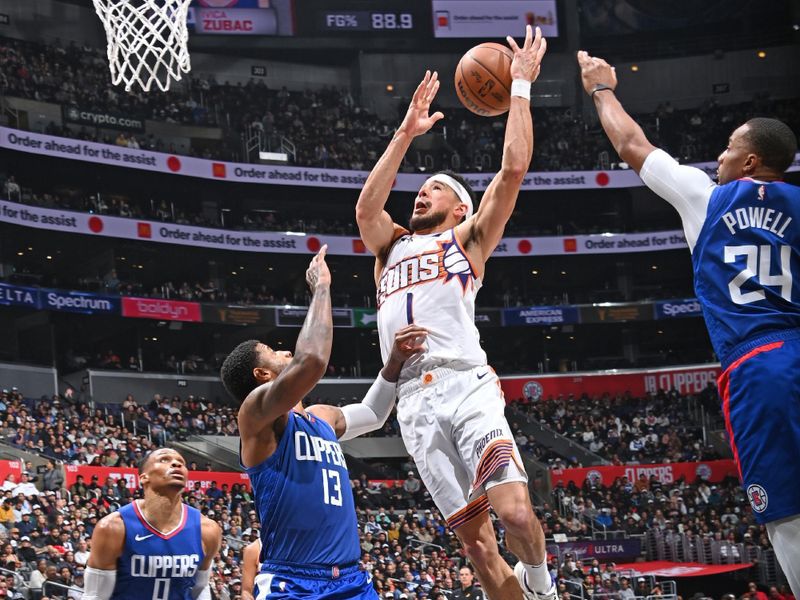 LOS ANGELES, CA - JANUARY 8: Devin Booker #1 of the Phoenix Suns drives to the basket during the game against the LA Clippers on January 8, 2024 at Crypto.Com Arena in Los Angeles, California. NOTE TO USER: User expressly acknowledges and agrees that, by downloading and/or using this Photograph, user is consenting to the terms and conditions of the Getty Images License Agreement. Mandatory Copyright Notice: Copyright 2024 NBAE (Photo by Andrew D. Bernstein/NBAE via Getty Images)