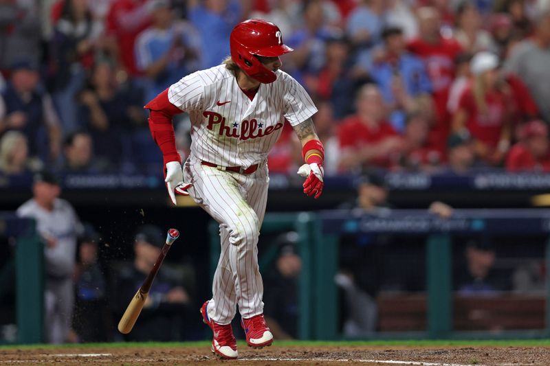 Oct 3, 2023; Philadelphia, Pennsylvania, USA; Philadelphia Phillies second baseman Bryson Stott (5) hits a RBI single in the fourth inning against the Miami Marlins for game one of the Wildcard series for the 2023 MLB playoffs at Citizens Bank Park. Mandatory Credit: Bill Streicher-USA TODAY Sports