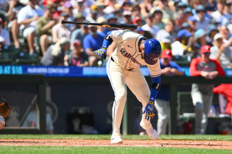 Aug 4, 2024; Seattle, Washington, USA; Seattle Mariners center fielder Victor Robles (10) lets go of his bat during a bunt attempt against the Philadelphia Phillies during the sixth inning at T-Mobile Park. Mandatory Credit: Steven Bisig-USA TODAY Sports