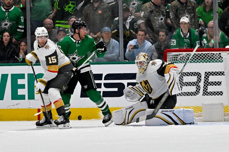 Apr 22, 2024; Dallas, Texas, USA; Dallas Stars center Joe Pavelski (16) attempts to redirect the puck past Vegas Golden Knights defenseman Noah Hanifin (15) and goaltender Logan Thompson (36) during the third period in game one of the first round of the 2024 Stanley Cup Playoffs at the American Airlines Center. Mandatory Credit: Jerome Miron-USA TODAY Sports