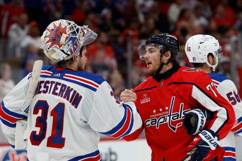 Apr 28, 2024; Washington, District of Columbia, USA; New York Rangers goaltender Igor Shesterkin (31) shakes hands with Washington Capitals right wing T.J. Oshie (77) in the handshake line after game four of the first round of the 2024 Stanley Cup Playoffs at Capital One Arena. Mandatory Credit: Geoff Burke-USA TODAY Sports