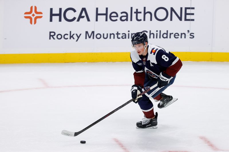 Oct 28, 2024; Denver, Colorado, USA; Colorado Avalanche defenseman Cale Makar (8) controls the puck in the first period against the Chicago Blackhawks at Ball Arena. Mandatory Credit: Isaiah J. Downing-Imagn Images