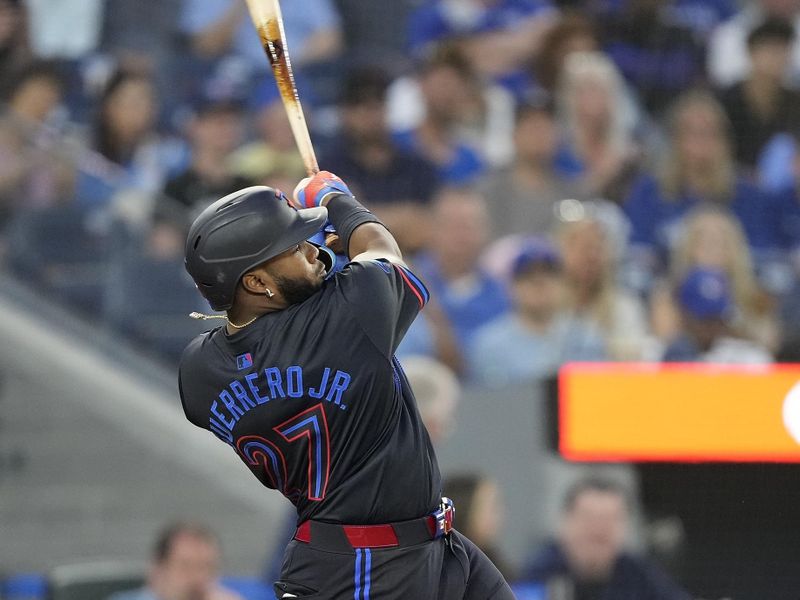 Jul 19, 2024; Toronto, Ontario, CAN; Toronto Blue Jays first baseman Vladimir Guerrero Jr. (27) hits a two run home run against the Detroit Tigers during the sixth inning at Rogers Centre. Mandatory Credit: John E. Sokolowski-USA TODAY Sports