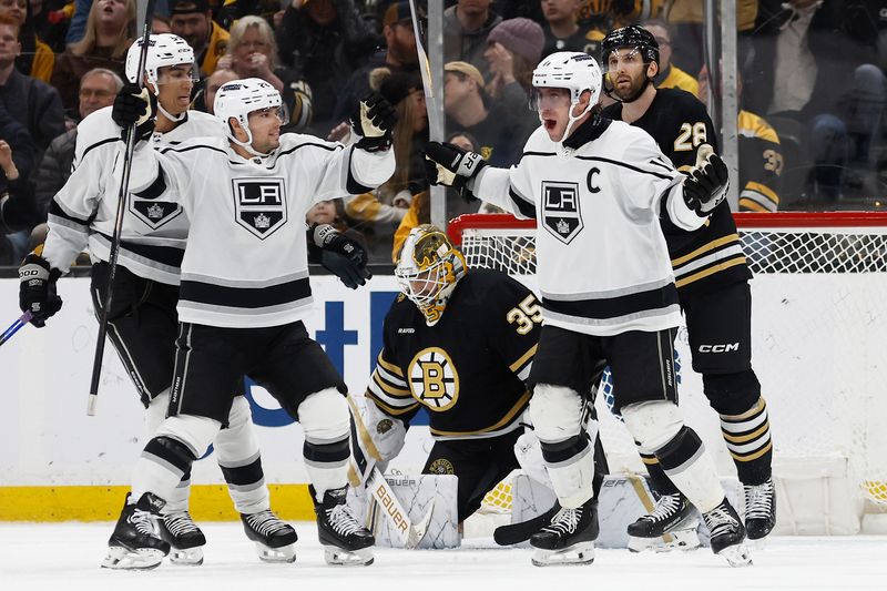 Feb 17, 2024; Boston, Massachusetts, USA; Los Angeles Kings center Anze Kopitar (11) celebrates his game tying goal against the Boston Bruins during the third period at TD Garden. Mandatory Credit: Winslow Townson-USA TODAY Sports