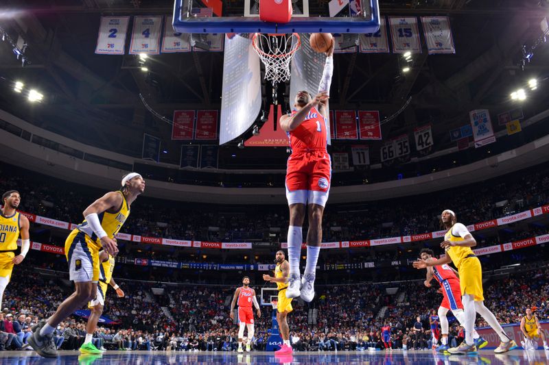 PHILADELPHIA, PA - DECEMBER 13: KJ Martin #1 of the Philadelphia 76ers drives to the basket during the game against the Indiana Pacers on December 13, 2024 at the Wells Fargo Center in Philadelphia, Pennsylvania NOTE TO USER: User expressly acknowledges and agrees that, by downloading and/or using this Photograph, user is consenting to the terms and conditions of the Getty Images License Agreement. Mandatory Copyright Notice: Copyright 2024 NBAE (Photo by Jesse D. Garrabrant/NBAE via Getty Images)