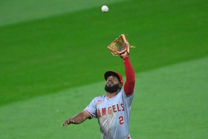 May 3, 2024; Cleveland, Ohio, USA; Los Angeles Angels second baseman Luis Rengifo (2) makes a catch in the eighth inning against the Cleveland Guardians at Progressive Field. Mandatory Credit: David Richard-USA TODAY Sports