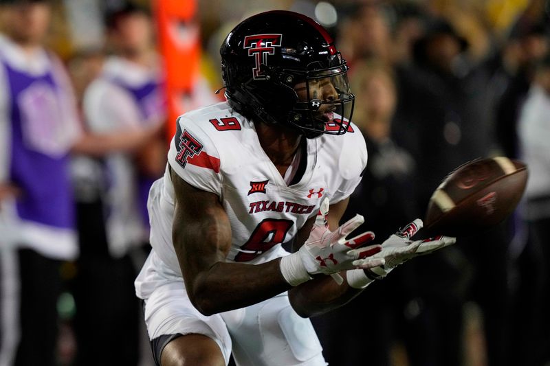 Sep 2, 2023; Laramie, Wyoming, USA; Texas Tech Red Raiders wide receiver Jerand Bradley (9) attempts to make a catch against the Wyoming Cowboys during the third quarter at Jonah Field at War Memorial Stadium. Mandatory Credit: Troy Babbitt-USA TODAY Sports