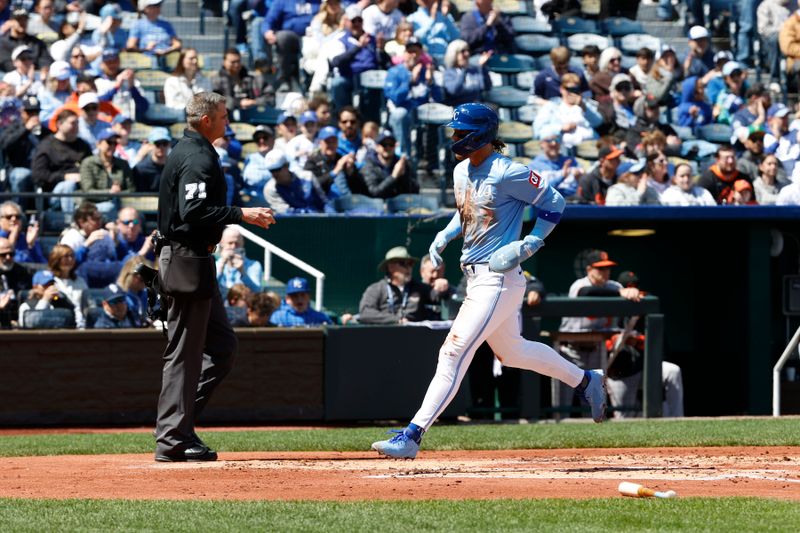 Apr 6, 2025; Kansas City, Missouri, USA;  Kansas City Royals shortstop Bobby Witt Jr. (7) scores at Kauffman Stadium. Mandatory Credit: Gary Rohman-Imagn Images