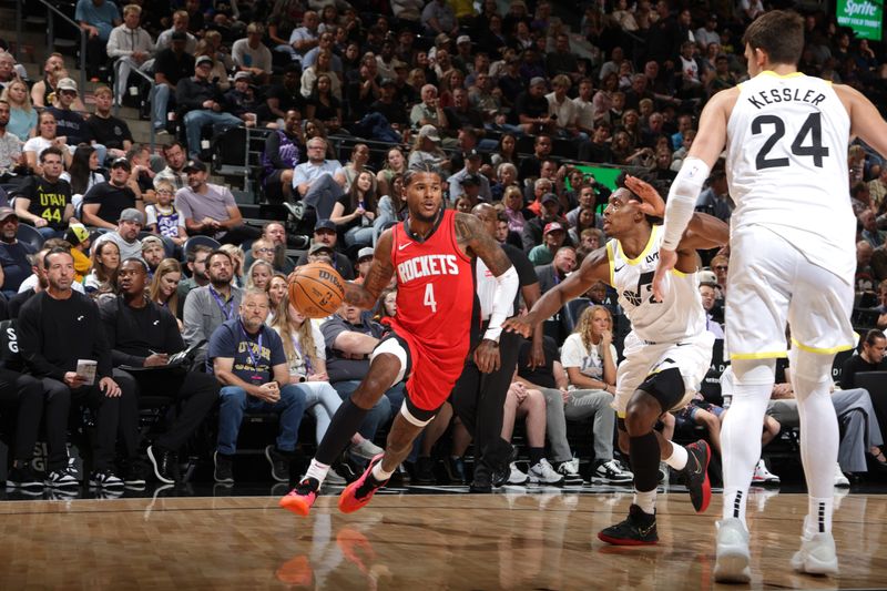 SALT LAKE CITY, UT - OCTOBER 7: Jalen Green #4 of the Houston Rockets handles the ball during the game against the Utah Jazz during a NBA preseason game on October 7, 2024 at the Delta Center in Salt Lake City, Utah. NOTE TO USER: User expressly acknowledges and agrees that, by downloading and or using this Photograph, User is consenting to the terms and conditions of the Getty Images License Agreement. Mandatory Copyright Notice: Copyright 2024 NBAE (Photo by Melissa Majchrzak/NBAE via Getty Images)