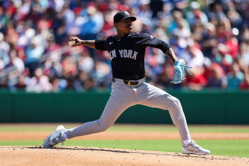 Feb 25, 2024; Clearwater, Florida, USA;  New York Yankees starting pitcher Marcus Stroman (0) throws a pitch  against the Philadelphia Phillies in the first inning at BayCare Ballpark. Mandatory Credit: Nathan Ray Seebeck-USA TODAY Sports