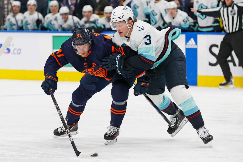 Jan 18, 2024; Edmonton, Alberta, CAN; Seattle Kraken defensemen Will Borgen (3) holds up Edmonton Oilers forward Connor McDavid (97) during the first period at Rogers Place. Mandatory Credit: Perry Nelson-USA TODAY Sports