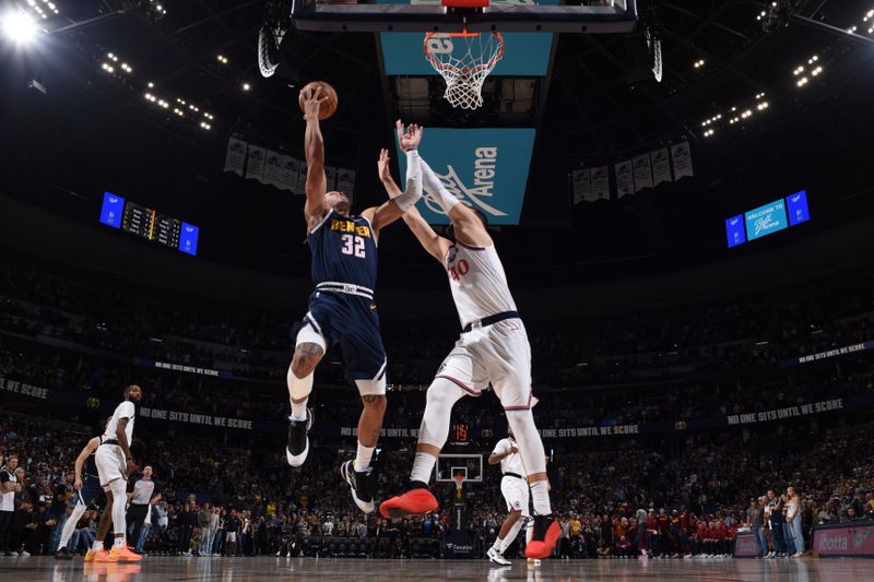 DENVER, CO - OCTOBER 26: Aaron Gordon #32 of the Denver Nuggets drives to the basket during the game against the LA Clippers on October 26, 2024 at the Ball Arena in Denver, Colorado. NOTE TO USER: User expressly acknowledges and agrees that, by downloading and/or using this Photograph, user is consenting to the terms and conditions of the Getty Images License Agreement. Mandatory Copyright Notice: Copyright 2024 NBAE (Photo by Garrett Ellwood/NBAE via Getty Images)