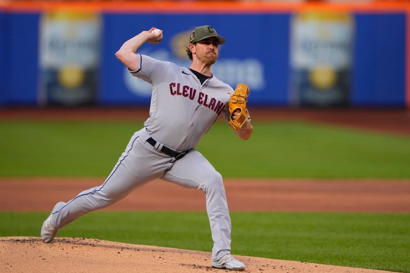 May 21, 2023; New York City, New York, USA; Cleveland Guardians pitcher Shane Bieber (57) delivers a pitch against the New York Mets during the first inning at Citi Field. Mandatory Credit: Gregory Fisher-USA TODAY Sports