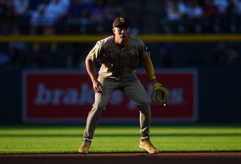 Aug 16, 2024; Denver, Colorado, USA; San Diego Padres shortstop Ha-Seong Kim (7) during the first inning against the Colorado Rockies at Coors Field. Mandatory Credit: Ron Chenoy-USA TODAY Sports