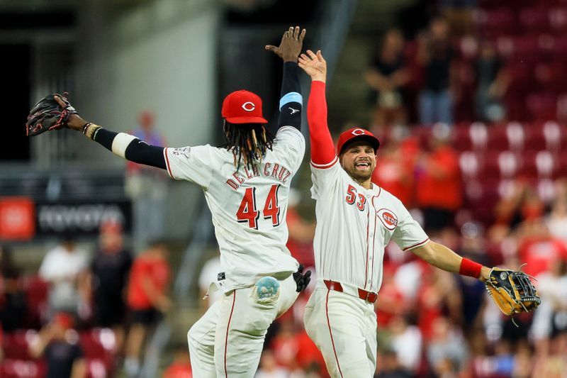 Jun 24, 2024; Cincinnati, Ohio, USA; Cincinnati Reds outfielder Levi Jordan (53) high fives shortstop Elly De La Cruz (44) after the victory over the Pittsburgh Pirates at Great American Ball Park. Mandatory Credit: Katie Stratman-USA TODAY Sports