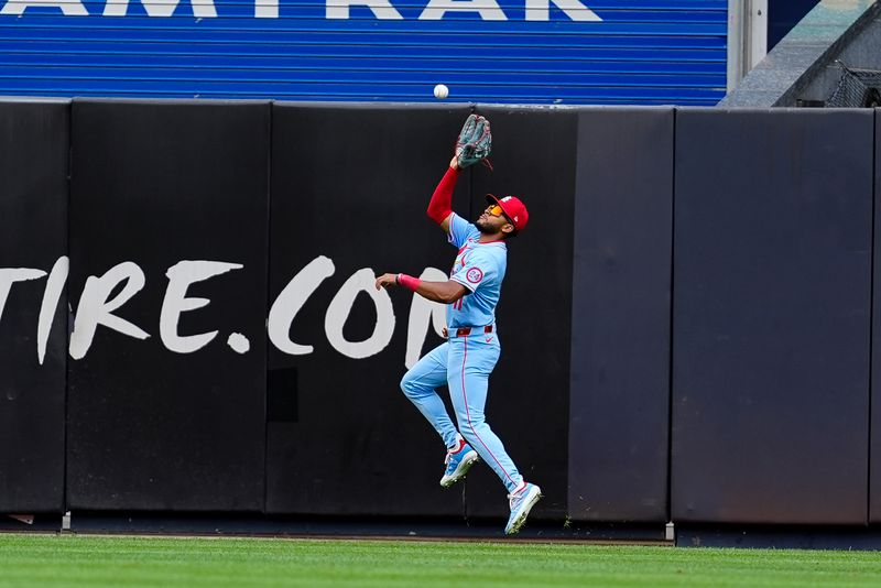 Aug 31, 2024; Bronx, New York, USA; St. Louis Cardinals center fielder Victor Scott II (11) catches a fly ball hit by New York Yankees second baseman Gleyber Torres (not pictured) during the ninth inning at Yankee Stadium. Mandatory Credit: Gregory Fisher-USA TODAY Sports