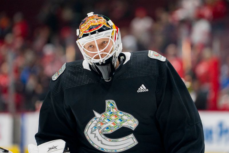 Feb 13, 2023; Vancouver, British Columbia, CAN; Vancouver Canucks goalie Collin Delia (60) skates during warm up prior to a game against the Detroit Red Wings at Rogers Arena. Mandatory Credit: Bob Frid-USA TODAY Sports