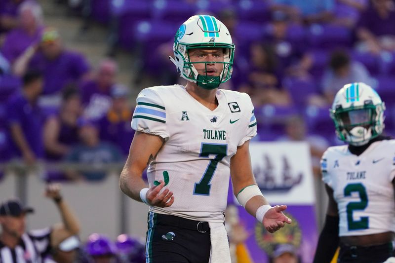 Oct 2, 2021; Greenville, North Carolina, USA;  Tulane Green Wave quarterback Michael Pratt (7) looks over to the sideline during the second half against the East Carolina Pirates at Dowdy-Ficklen Stadium. Mandatory Credit: James Guillory-USA TODAY Sports