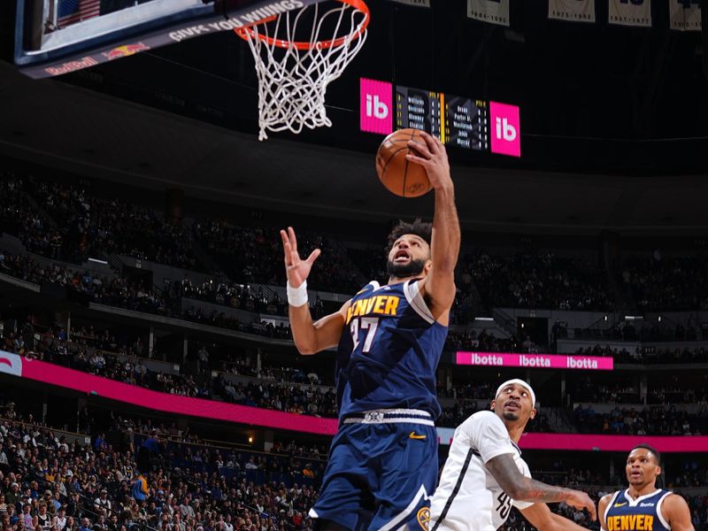 DENVER, CO - JANUARY 10: Jamal Murray #27 of the Denver Nuggets drives to the basket during the game against the Brooklyn Nets on January 10, 2025 at Ball Arena in Denver, Colorado. NOTE TO USER: User expressly acknowledges and agrees that, by downloading and/or using this Photograph, user is consenting to the terms and conditions of the Getty Images License Agreement. Mandatory Copyright Notice: Copyright 2025 NBAE (Photo by Garrett Ellwood/NBAE via Getty Images)