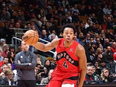 TORONTO, CANADA - DECEMBER 6: Scottie Barnes #4 of the Toronto Raptors drives to the basket during the game against the Miami Heat on December 6, 2023 at the Scotiabank Arena in Toronto, Ontario, Canada.  NOTE TO USER: User expressly acknowledges and agrees that, by downloading and or using this Photograph, user is consenting to the terms and conditions of the Getty Images License Agreement.  Mandatory Copyright Notice: Copyright 2023 NBAE (Photo by Vaughn Ridley/NBAE via Getty Images)