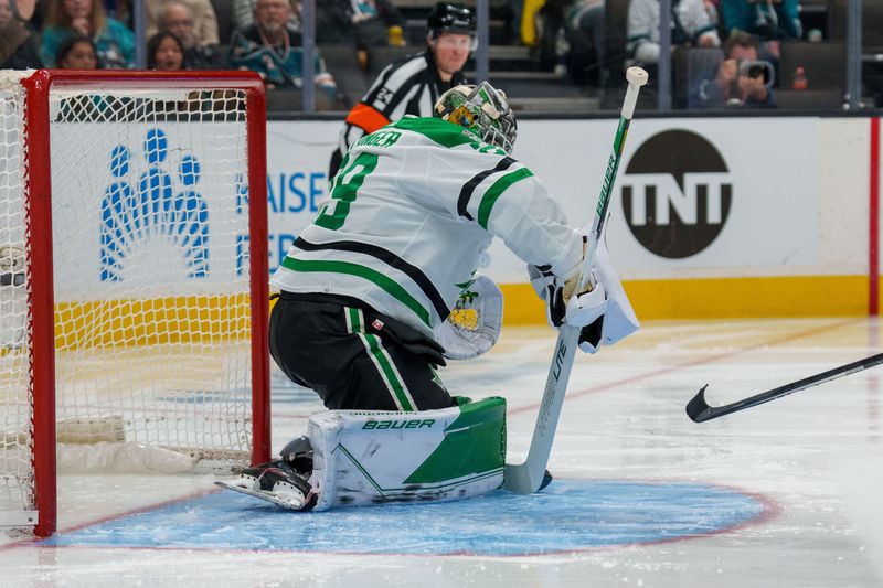 Jan 18, 2023; San Jose, California, USA; Dallas Stars goaltender Jake Oettinger (29) makes a save during the second period against the San Jose Sharks at SAP Center at San Jose. Mandatory Credit: Neville E. Guard-USA TODAY Sports