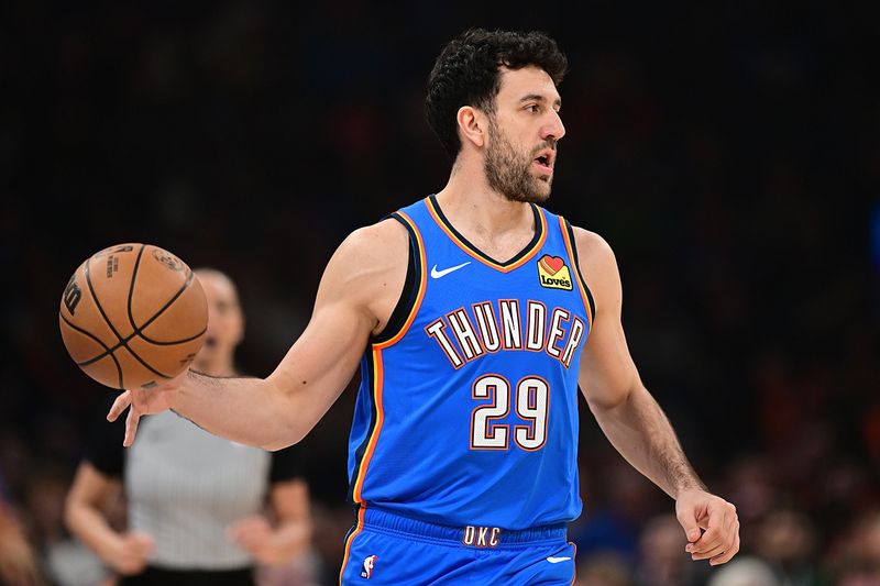 OKLAHOMA CITY, OKLAHOMA - JANUARY 31: Vasilije Micic #29 of the Oklahoma City Thunder handles the ball during the first half against the Denver Nuggets at Paycom Center on January 31, 2024 in Oklahoma City, Oklahoma. NOTE TO USER: User expressly acknowledges and agrees that, by downloading and or using this Photograph, user is consenting to the terms and conditions of the Getty Images License Agreement. (Photo by Joshua Gateley/Getty Images)