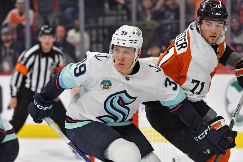 Feb 10, 2024; Philadelphia, Pennsylvania, USA; Seattle Kraken defenseman Ryker Evans (39) and Philadelphia Flyers right wing Tyson Foerster (71) battle during the third period at Wells Fargo Center. Mandatory Credit: Eric Hartline-USA TODAY Sports