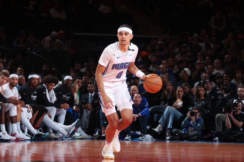 NEW YORK, NY - DECEMBER 3: Anthony Black #0 of the Orlando Magic dribbles the ball during the game against the New York Knicks during the Emirates NBA Cup on December 3, 2024 at Madison Square Garden in New York City, New York.  NOTE TO USER: User expressly acknowledges and agrees that, by downloading and or using this photograph, User is consenting to the terms and conditions of the Getty Images License Agreement. Mandatory Copyright Notice: Copyright 2024 NBAE  (Photo by Nathaniel S. Butler/NBAE via Getty Images)